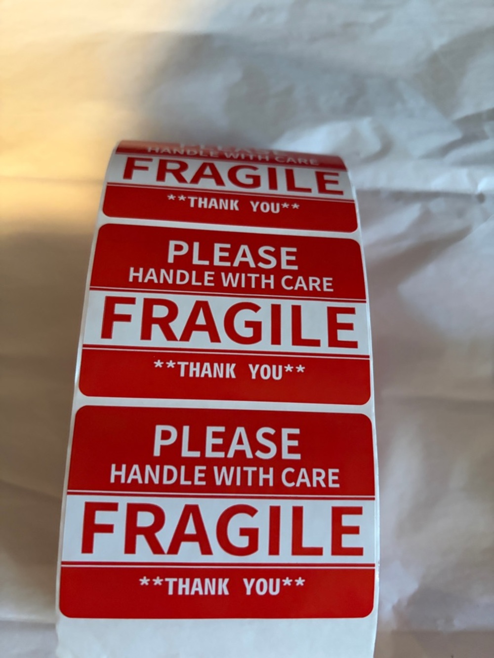 Roll of Red and White "FRAGILE" Shipping Labels